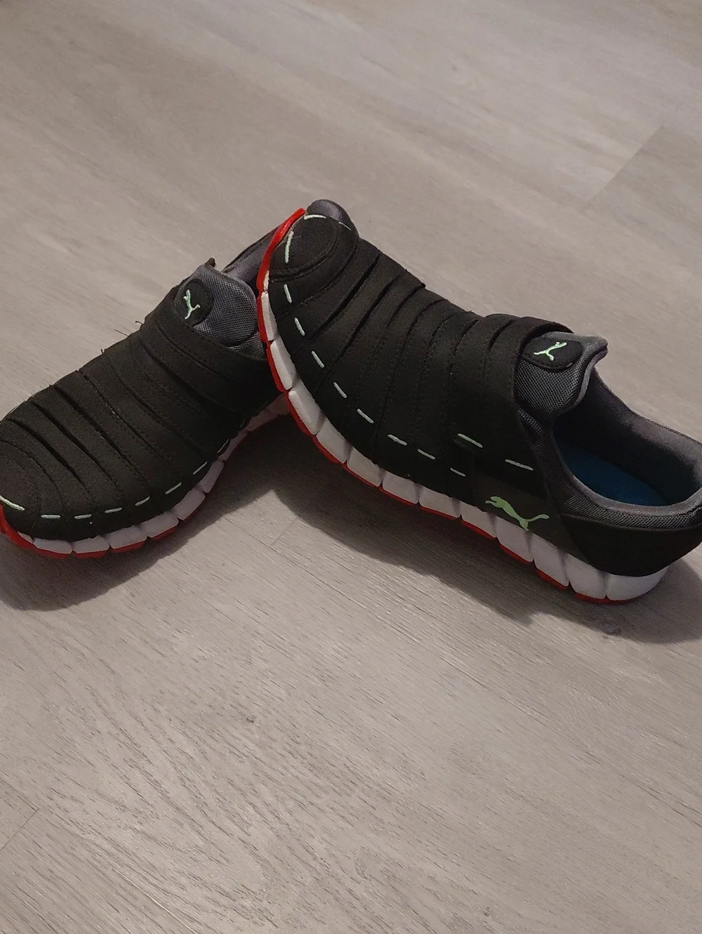 Puma Black Slip-On Sneakers with Red and Mint Accents